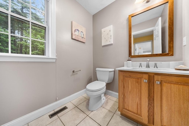 21 Butterfield Ln, Westford, MA 01886 - half bath featuring vanity, tile patterned floors, toilet, and baseboards