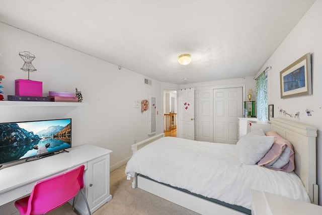 21 Butterfield Ln, Westford, MA 01886 - bedroom featuring light colored carpet and a closet
