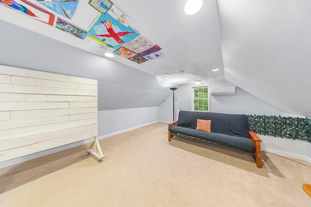 21 Butterfield Ln, Westford, MA 01886 - living area with a wall mounted air conditioner, carpet flooring, vaulted ceiling, and baseboards