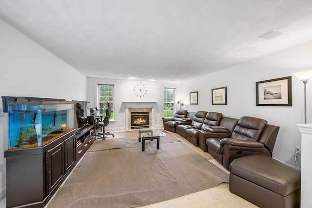 21 Butterfield Ln, Westford, MA 01886 - carpeted living area featuring a high end fireplace and baseboards
