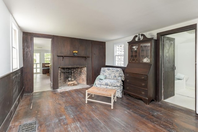40 Scotchmans Ln, West Tisbury, MA 02575 - sitting room featuring dark wood finished floors and a large fireplace