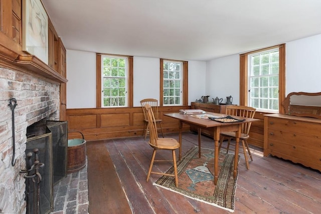 40 Scotchmans Ln, West Tisbury, MA 02575 - dining area featuring dark wood-style flooring, plenty of natural light, and a fireplace