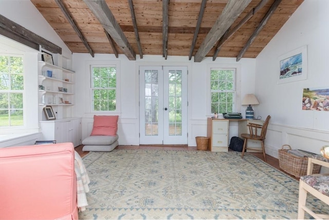 40 Scotchmans Ln, West Tisbury, MA 02575 - living room featuring wood ceiling, french doors, a decorative wall, wood finished floors, and wainscoting