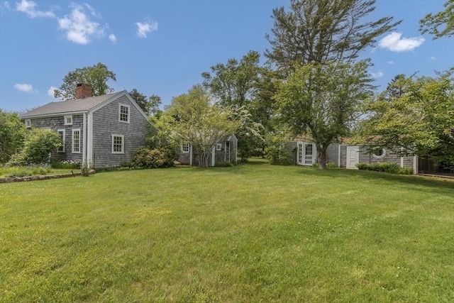 40 Scotchmans Ln, West Tisbury, MA 02575 - view of grassy yard with an outbuilding