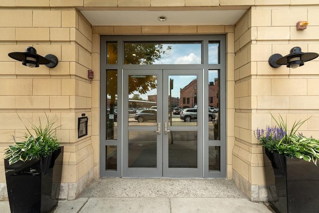 entrance to property featuring french doors