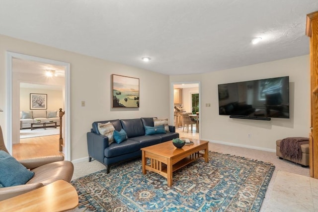 67 Flanagan Dr, Framingham, MA 01701 - living area featuring baseboards and carpet flooring