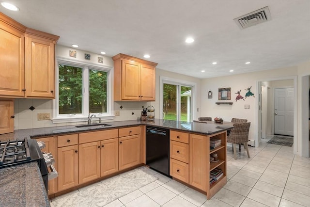 67 Flanagan Dr, Framingham, MA 01701 - kitchen with black appliances, a peninsula, light tile patterned floors, recessed lighting, and dark stone countertops