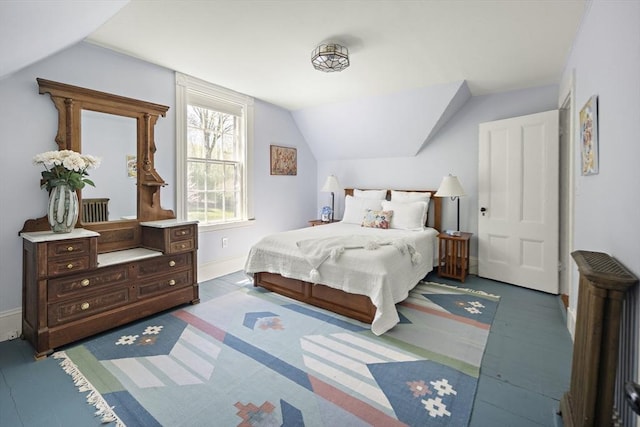 185 Woodland St, Natick, MA 01760 - bedroom featuring lofted ceiling and baseboards