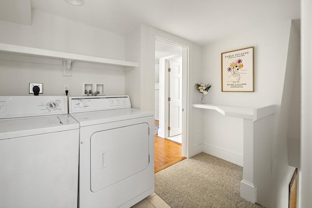 185 Woodland St, Natick, MA 01760 - clothes washing area with washer and clothes dryer, light colored carpet, and baseboards