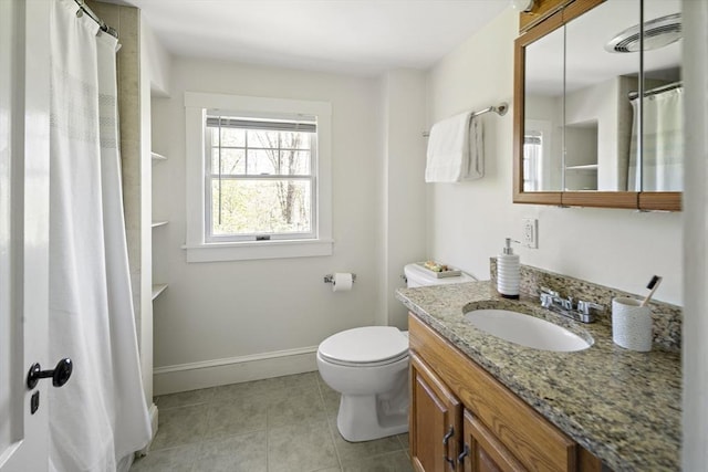 185 Woodland St, Natick, MA 01760 - bathroom featuring tile patterned floors, vanity, toilet, baseboards, and a shower with curtain