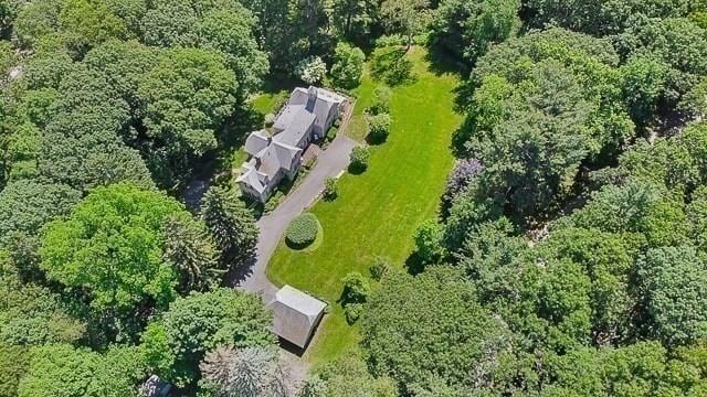 185 Woodland St, Natick, MA 01760 - view of property location with a heavily wooded area