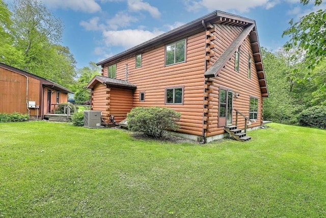 1175 Main Rd, Westport, MA 02790 - back of house featuring log exterior and a lawn