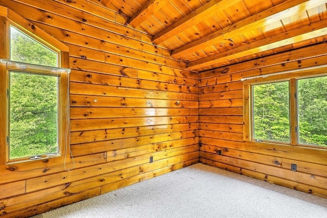 1175 Main Rd, Westport, MA 02790 - empty room featuring wooden ceiling with exposed beams, carpet floors, and wooden walls