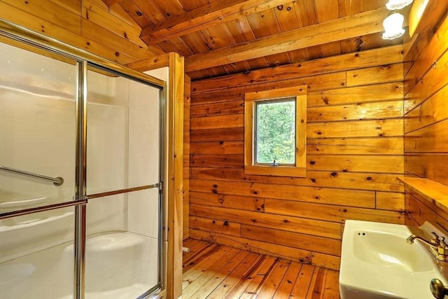 1175 Main Rd, Westport, MA 02790 - full bath with a stall shower, wooden walls, a sink, wood ceiling with exposed beams, and wood-type flooring