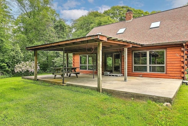 1175 Main Rd, Westport, MA 02790 - surrounding community with a patio and a yard