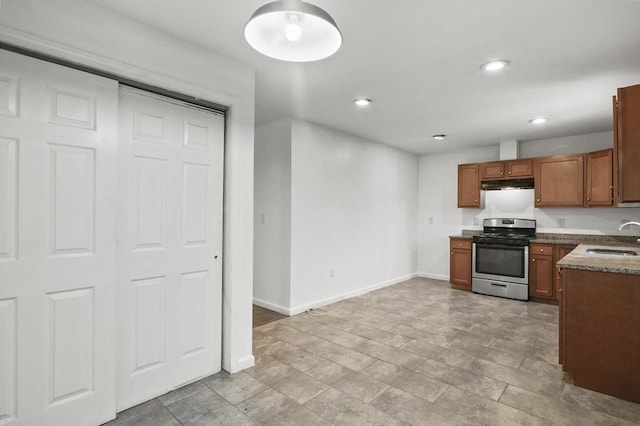 kitchen with sink and stainless steel gas range