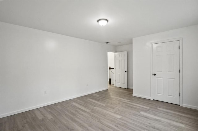 unfurnished bedroom with light hardwood / wood-style flooring