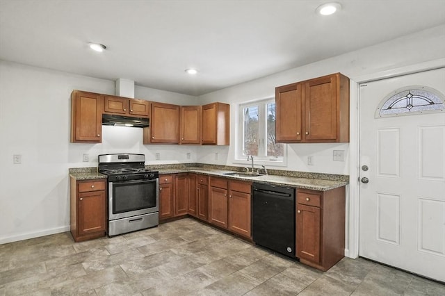 kitchen featuring light stone countertops, stainless steel range with gas cooktop, black dishwasher, and sink