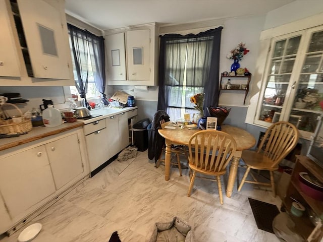 156 Euclid Ave, Lynn, MA 01904 - kitchen with light countertops and white cabinets