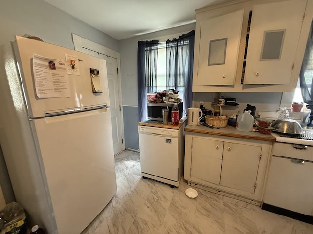 156 Euclid Ave, Lynn, MA 01904 - kitchen featuring white appliances, light countertops, light marble finish floors, and cream cabinetry