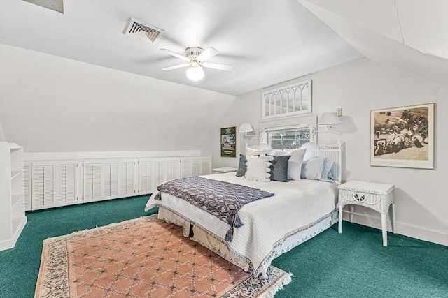 bedroom featuring visible vents, a ceiling fan, carpet flooring, vaulted ceiling, and baseboards