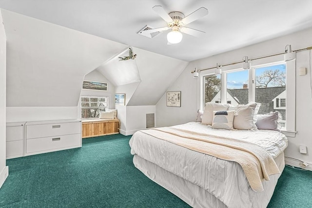 bedroom with a ceiling fan, dark colored carpet, and lofted ceiling