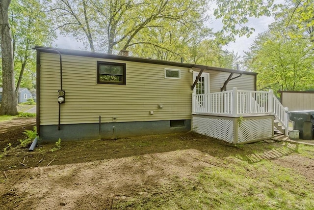 rear view of house with a deck