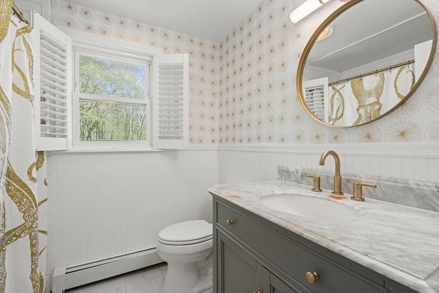 40 Brewster Rd, Cohasset, MA 02025 - full bathroom with a baseboard heating unit, wallpapered walls, wainscoting, toilet, and vanity