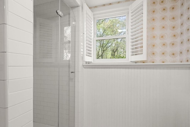 40 Brewster Rd, Cohasset, MA 02025 - bathroom featuring a shower stall and wainscoting