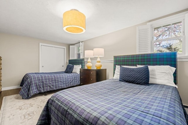 40 Brewster Rd, Cohasset, MA 02025 - bedroom featuring wood finished floors and baseboards
