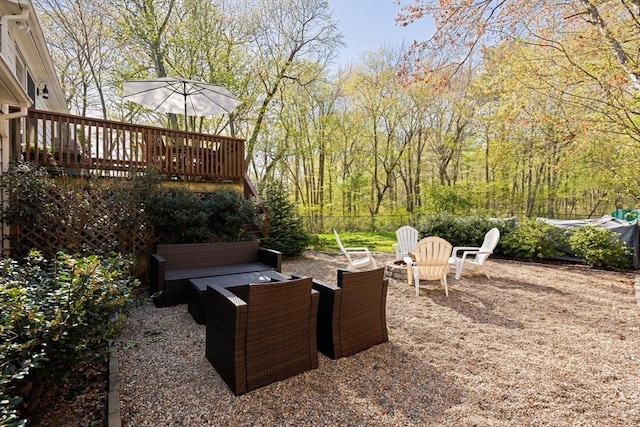 40 Brewster Rd, Cohasset, MA 02025 - view of yard with a deck, a patio, an outdoor fire pit, and fence