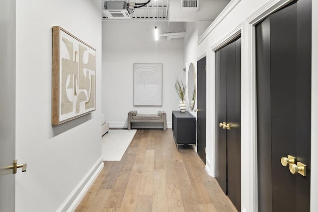 hallway featuring light hardwood / wood-style floors