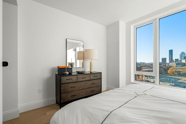 bedroom featuring light hardwood / wood-style floors