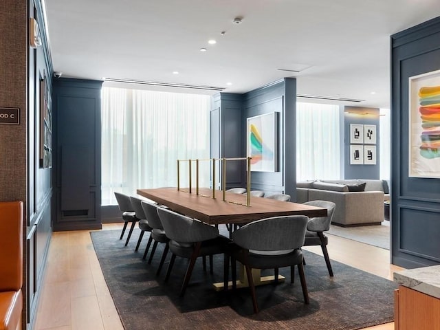 dining area with light wood-type flooring