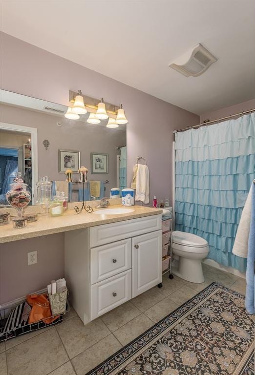 full bathroom featuring toilet, tile patterned flooring, visible vents, and vanity