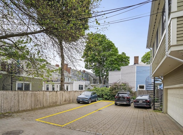4 Lincoln Pl Unit 4, Boston, MA 02129 - uncovered parking lot featuring a residential view