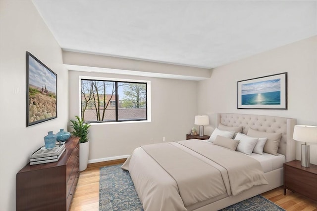 41 Centre Unit 208, Brookline, MA 02446 - bedroom featuring light wood finished floors and baseboards