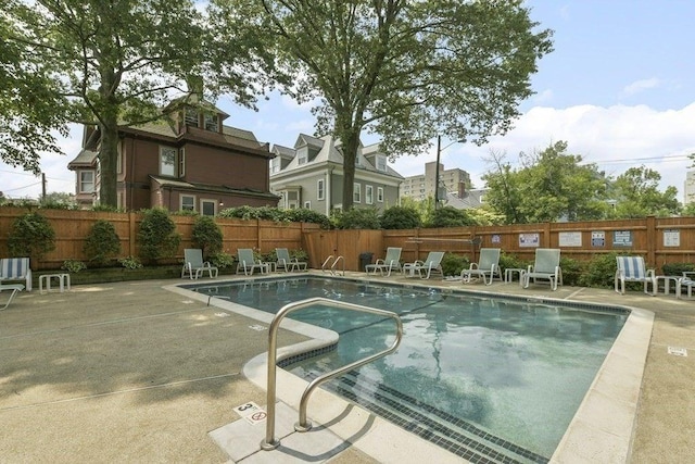41 Centre Unit 208, Brookline, MA 02446 - community pool with a patio and fence