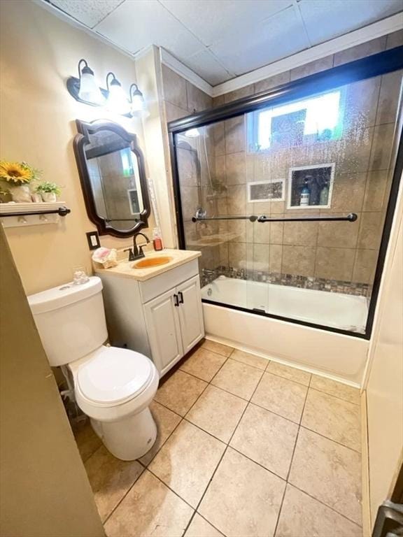98-100 Fenwick St, Springfield, MA 01109 - bathroom featuring combined bath / shower with glass door, vanity, and tile patterned flooring