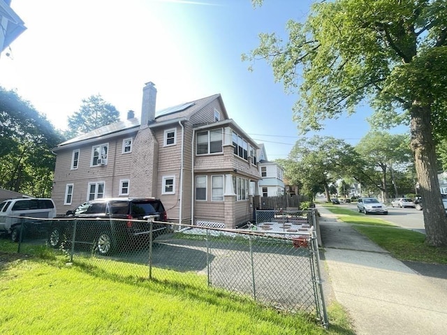 98-100 Fenwick St, Springfield, MA 01109 - back of property with a chimney