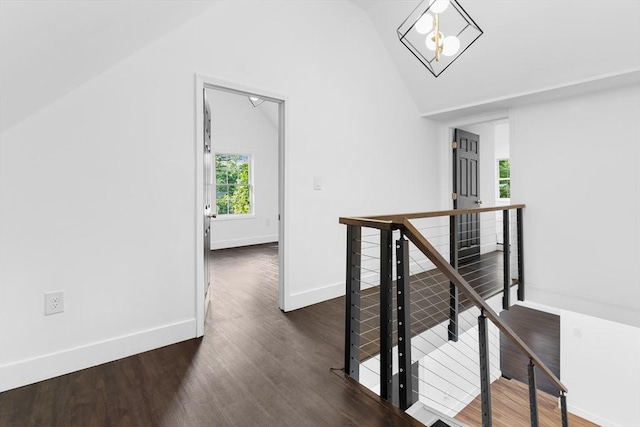 21 Beechwood Ave, Pembroke, MA 02359 - hallway with an upstairs landing, vaulted ceiling, and wood finished floors