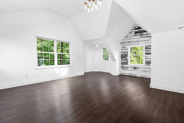 21 Beechwood Ave, Pembroke, MA 02359 - unfurnished living room featuring dark wood-type flooring and vaulted ceiling