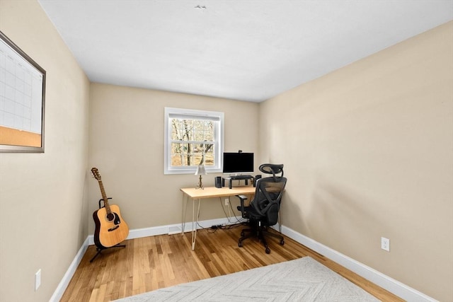 office with hardwood / wood-style floors