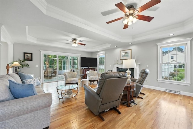 11 Rachael Ter, Westfield, MA 01085 - living area featuring a tray ceiling, a ceiling fan, light wood finished floors, ornamental molding, and recessed lighting