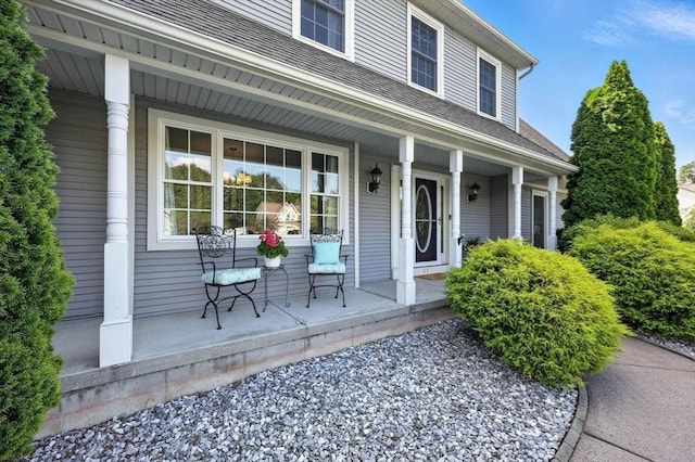 11 Rachael Ter, Westfield, MA 01085 - view of exterior entry featuring covered porch and a shingled roof
