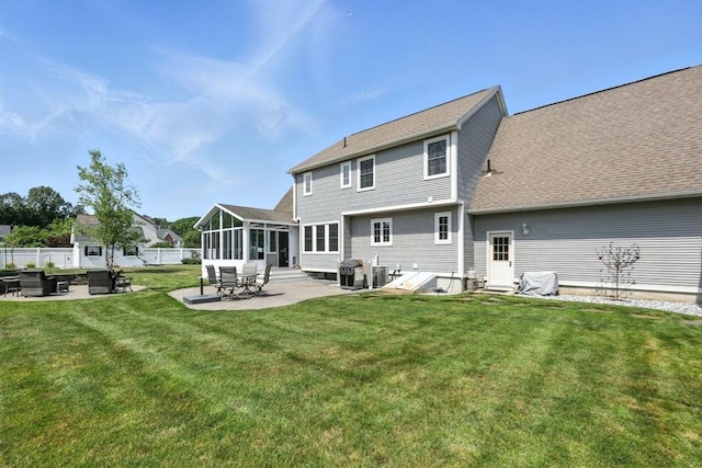 11 Rachael Ter, Westfield, MA 01085 - rear view of property with a sunroom, a patio, and roof with shingles