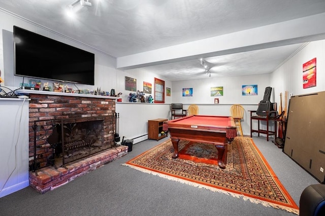 recreation room with a baseboard heating unit, carpet flooring, billiards table, rail lighting, and a brick fireplace