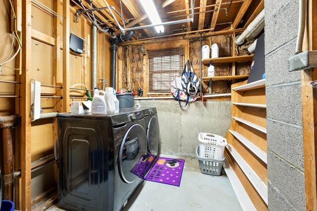 basement with separate washer and dryer