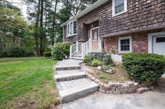 doorway to property with a lawn