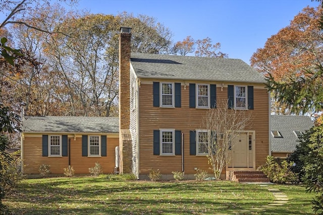 8 School House Vlg, Oak Bluffs, MA 02557 - colonial-style house with a chimney and a front yard